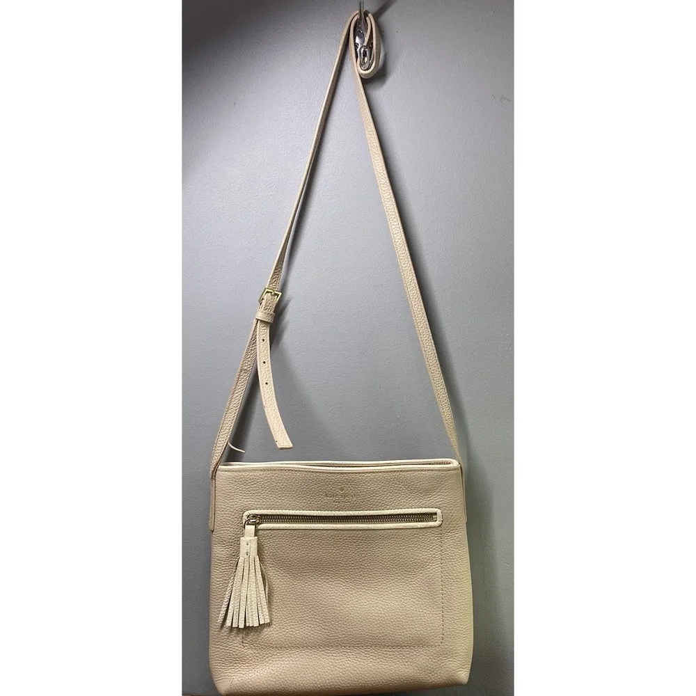 Kate Spade NY Purse Cross Body Tan Pebble Leather Bag Tassle Front Purse 10x11x2